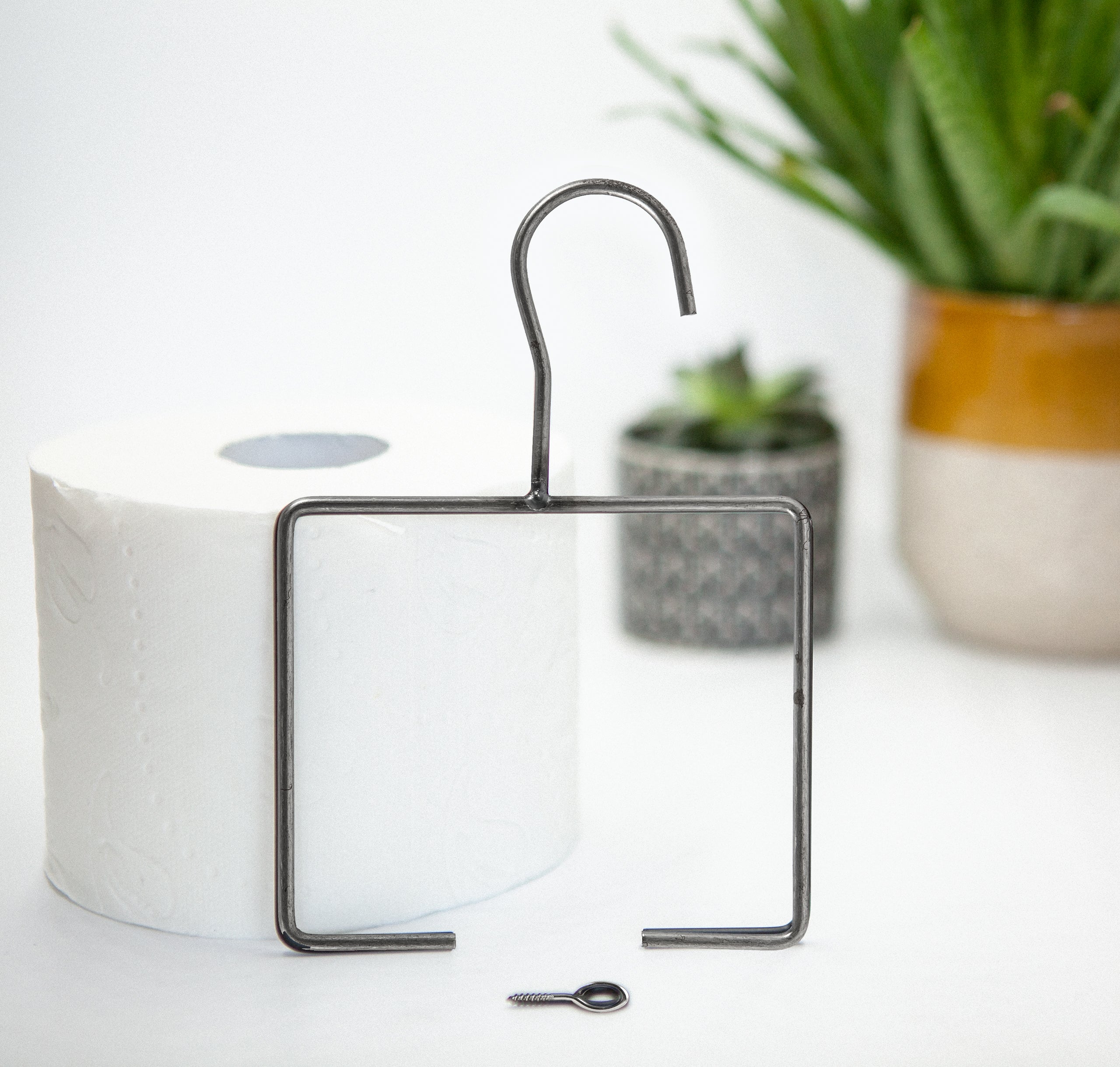 Toiletrol houder hanger